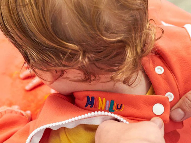 hone.pd-our-work-baby-bib